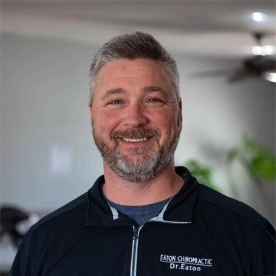A headshot of Dr. Matthew Eaton, a chiropractor at Eaton Chiropractic.
